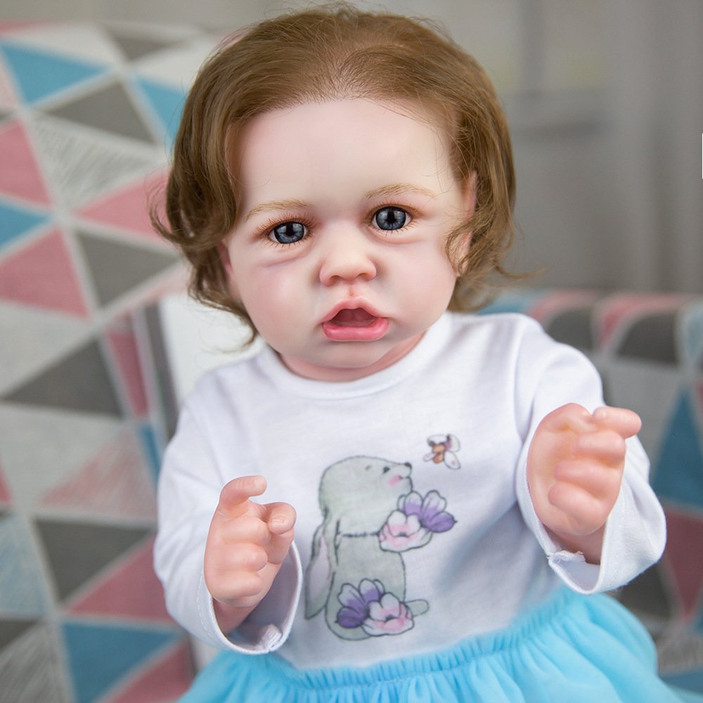  Niedliches Silikonbaby, das Haltung sitzt - Super X Studio Motiv 